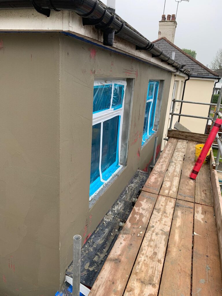 Potters Bar-100mm Insulated Render with silicon top coat finish.